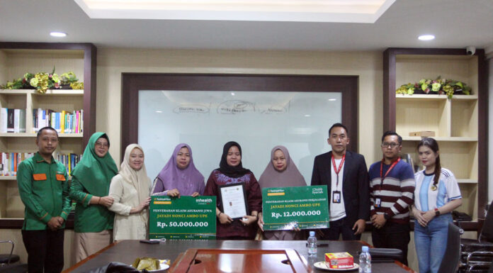 Tazkiyah Tour Serahkan Dua Asuransi ke Ahli Waris Jemaah Haji yang Wafat